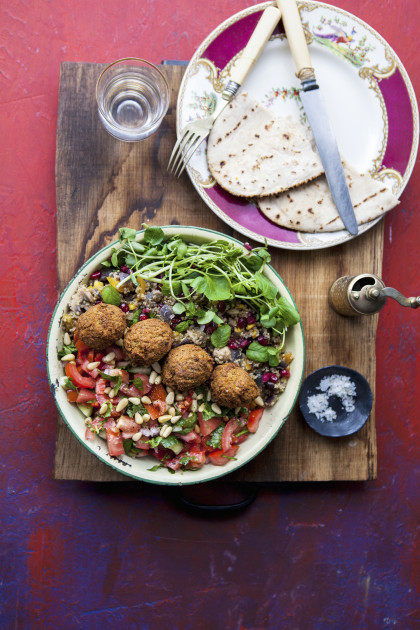 Quinoa, buddha bowl with coriander, falafel, mint, pine nuts and watercress