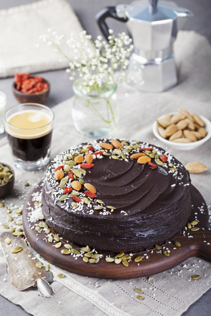Vegan chocolate beet cake with avocado frosting, nuts and seeds