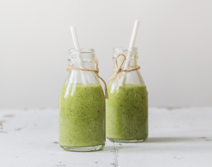 Green smoothies with avocado, kiwi, spinach, ginger and chia seeds