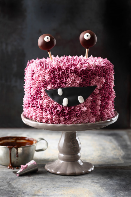 Pink 'Monster Alarm' buttercream cake