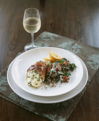 Broiled prosciutto-wrapped halibut with lentils