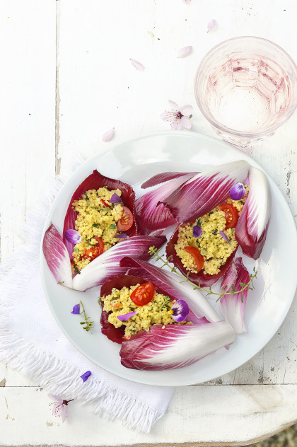 Red chicory leaves garnished flowery tabbouleh