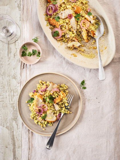 Warm yellow lentil, smoked fish and red onion salad