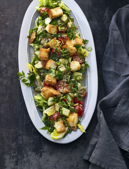 Sourdough bread salad with tahini, tomatoes, cucumber and mint