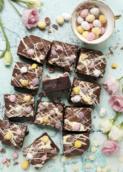 Chocolate brownies for Easter with white chocolate and pastel coloured mini eggs