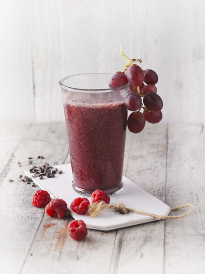 Red radish and raspberry smoothie with purple grapes
